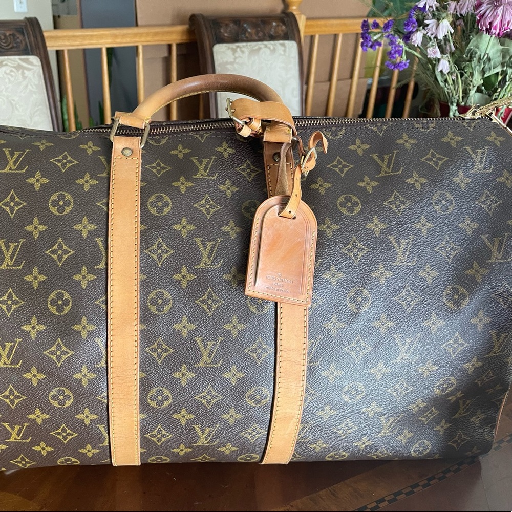 Authentic Louis Vuitton bandolier 55,
